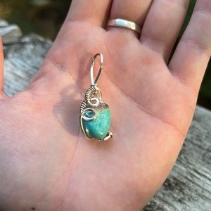 Handmade turquoise and sterling silver wire wrap pendant